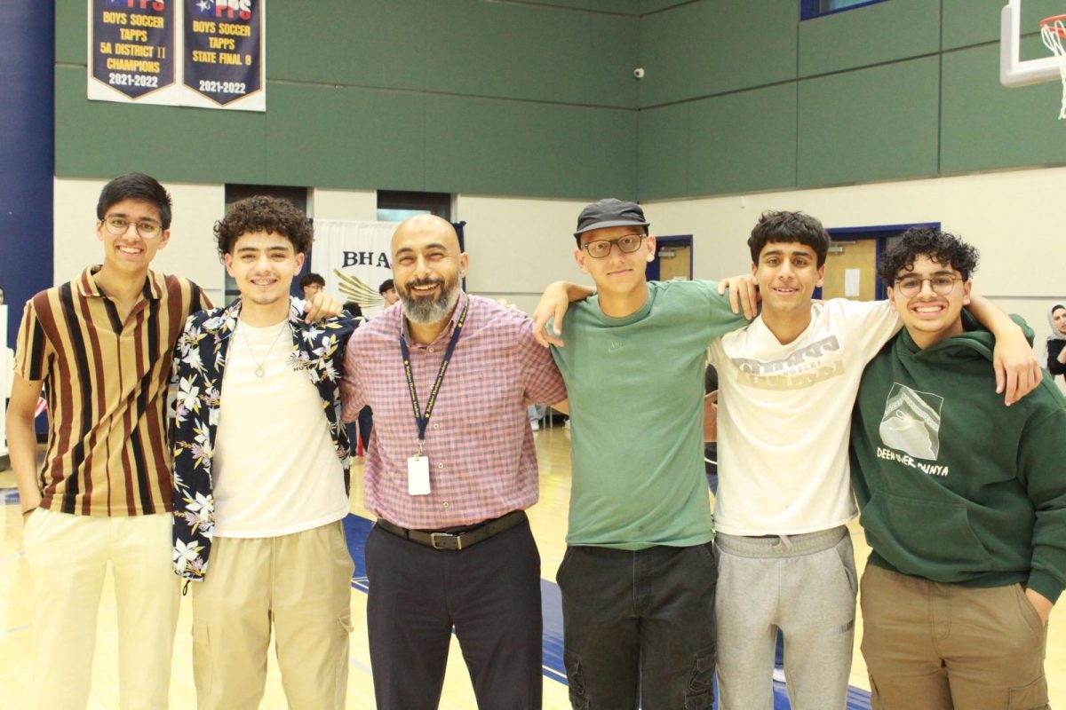 A group of high school juniors pose with Br.Sami (3rd from the left), at the Back to School Bash.