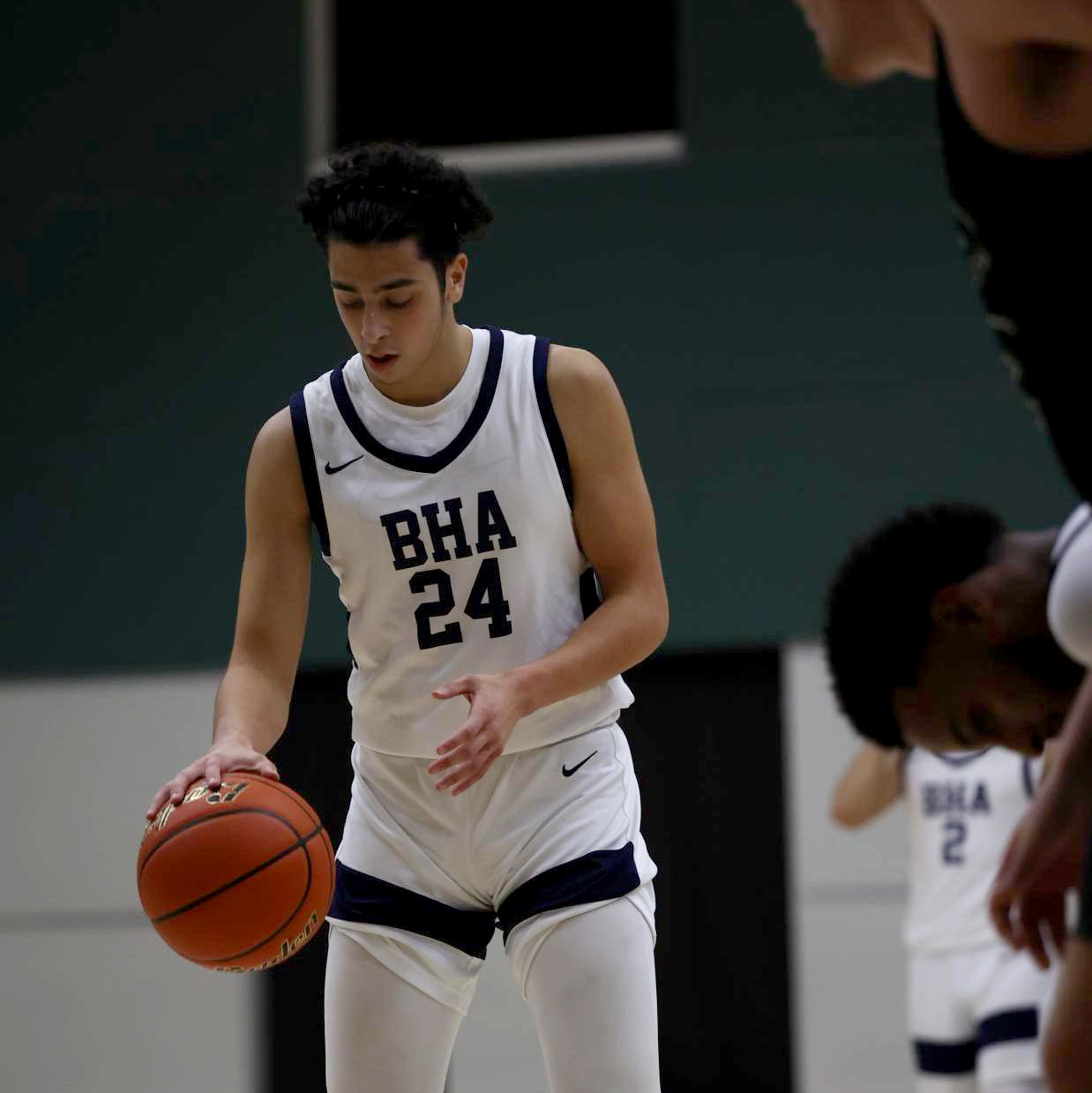 Ibraheem Morsy, a BHA alum, during a high school basketball game at the free throw line.