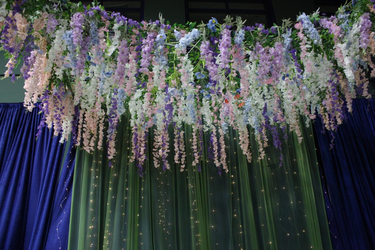 Flower décor on the stage at the BHA Girls' Gala 2025. 
