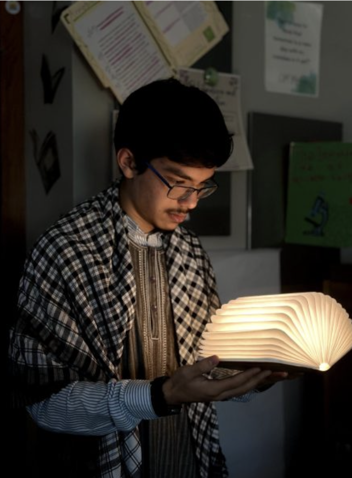 Ahmed Sajjad's winning photo titled, "The Power of Reading".