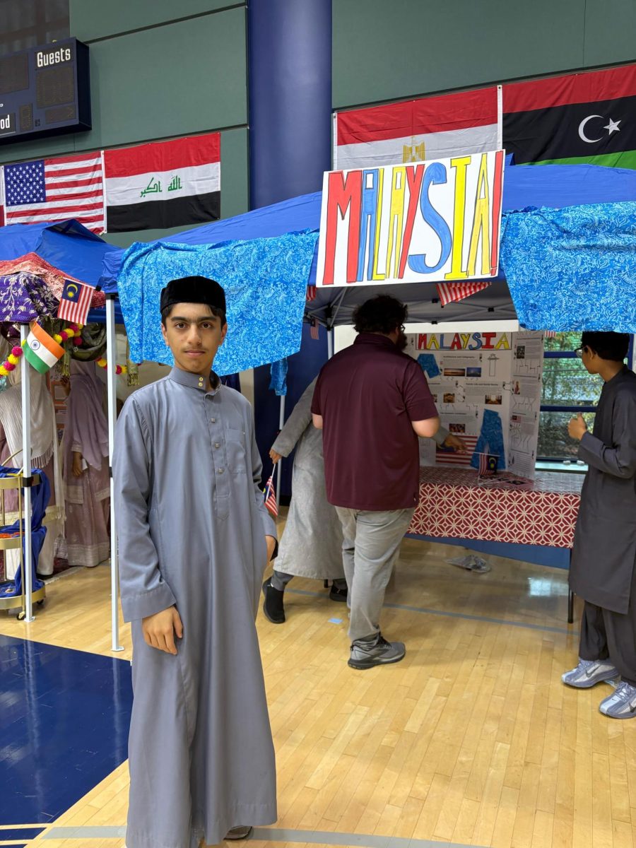 Freshman Yousuf Jafree showcasing his Malaysia stand.